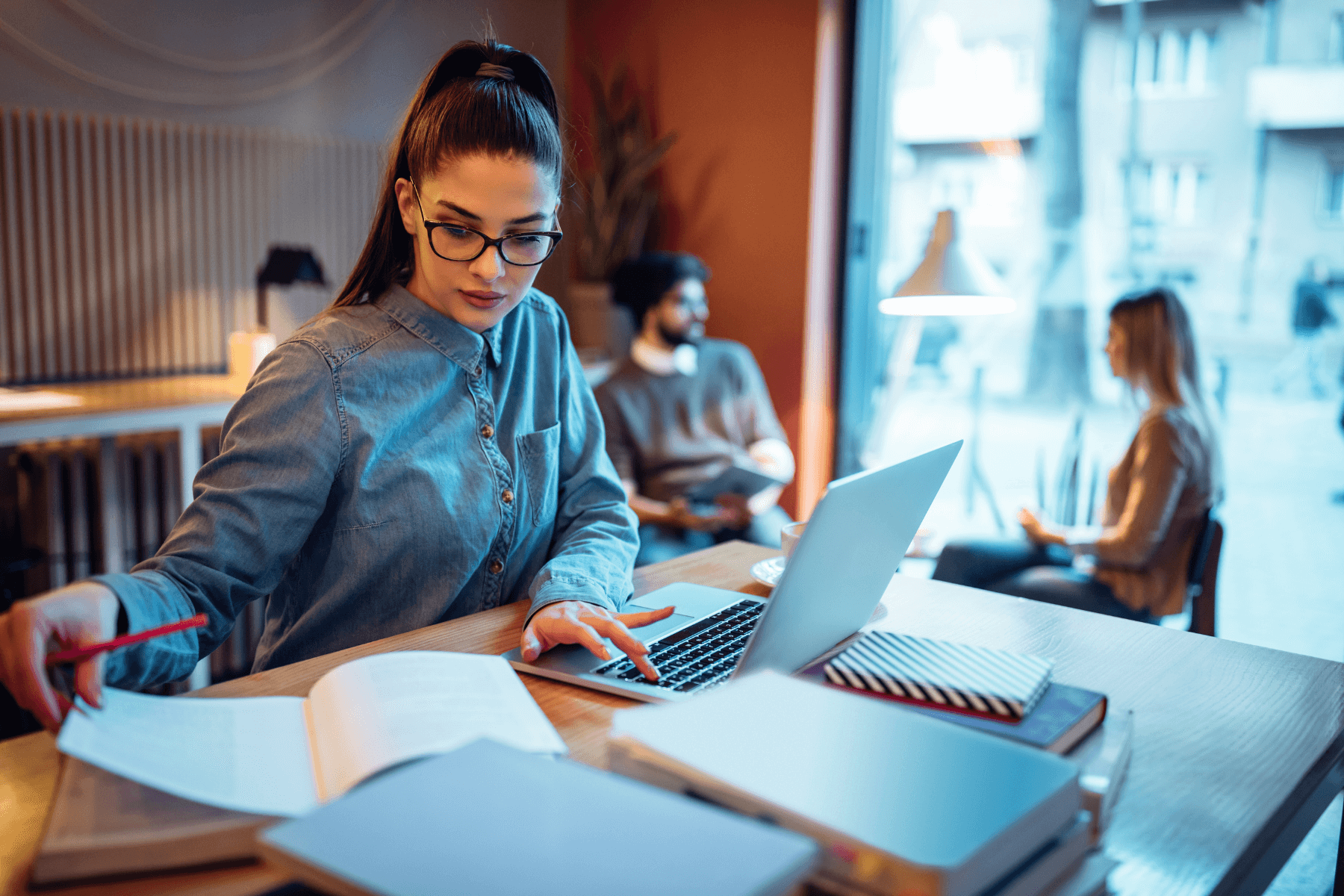 Young woman studying in a library